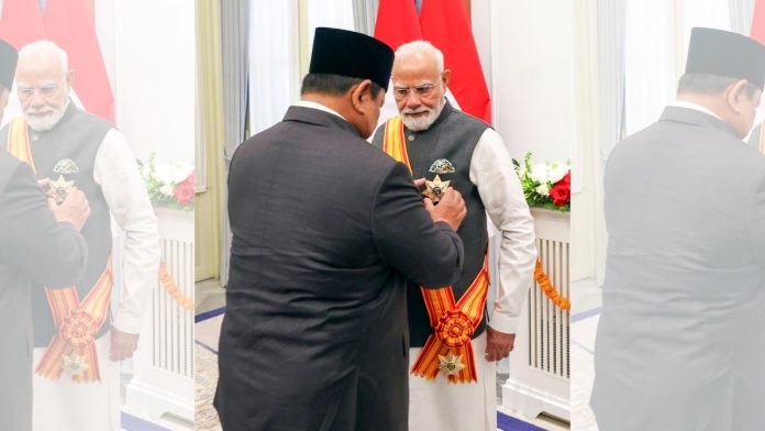 செவ்வாய்க்கிழமை ஜகார்த்தாவில் உள்ள ஜனாதிபதி மாளிகையான இஸ்தானா மெர்டேகாவில் பிரதமர் நரேந்திர மோடிக்கு பிண்டாங் ஆதிபூர்ணா பதக்கத்தை இந்தோனேசிய ஜனாதிபதி பிரபோவோ சுபியாண்டோ வழங்கினார் | @MEAIindia X/ANI புகைப்படம்